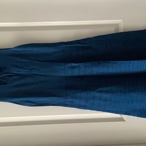 Cleo sleeveless midi dress with a textured pattern.